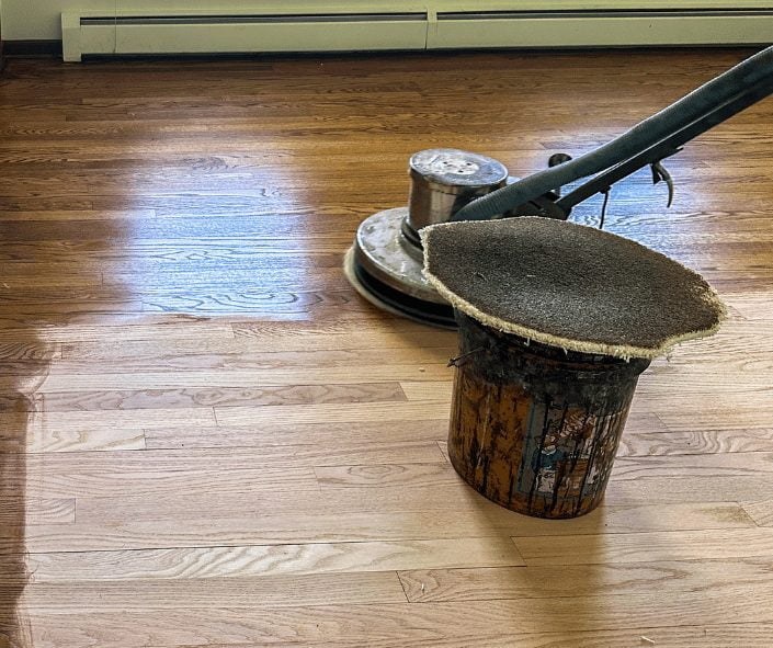 A refinished hardwood floor shining in a home