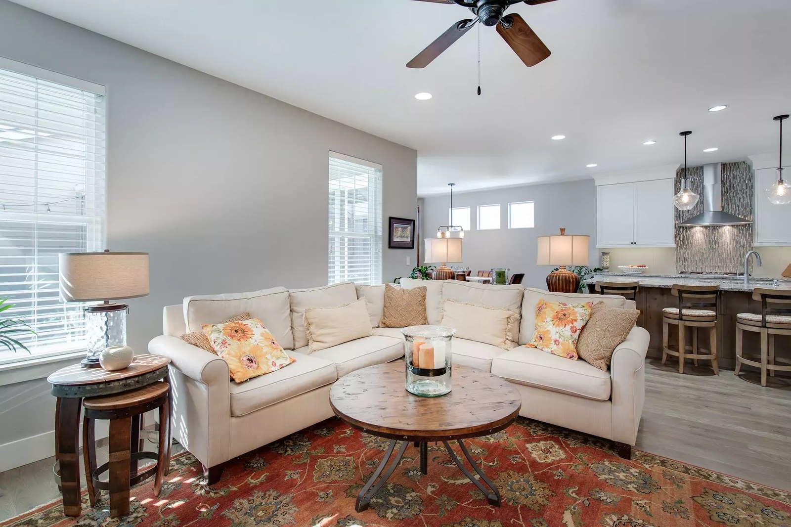 A living room with a finely cleaned sofa